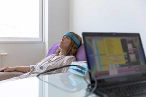 A woman undergoing biofeedback therapy
