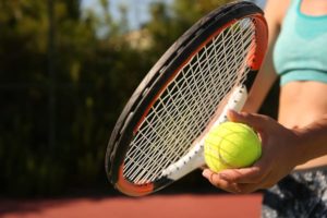 Young woman playing tennis