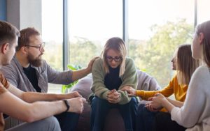 People console a person who has ADHD disorder