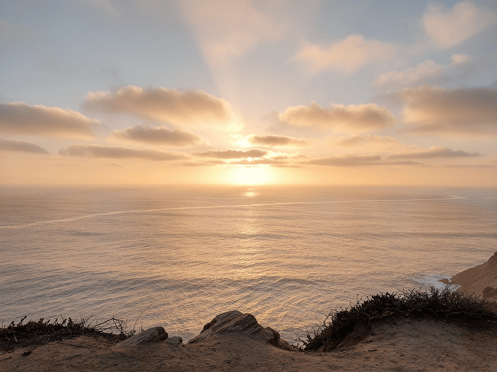 Sunrise over the Pacific Ocean from Malibu cliffs representing hope in recovery