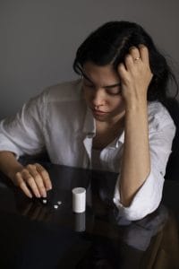 Young woman struggling with anxiety and stress